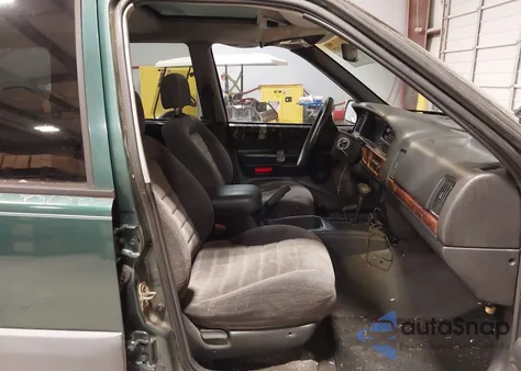 1997 Jeep Grand Cherokee Laredo/Tsi из США, поврежденный, VIN 1J4GZ58S9VC575673